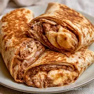 S&uuml;&szlig;e Wrap R&ouml;llchen mit Nutella und Banane